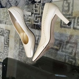 Size 7M 3" bone color heels.